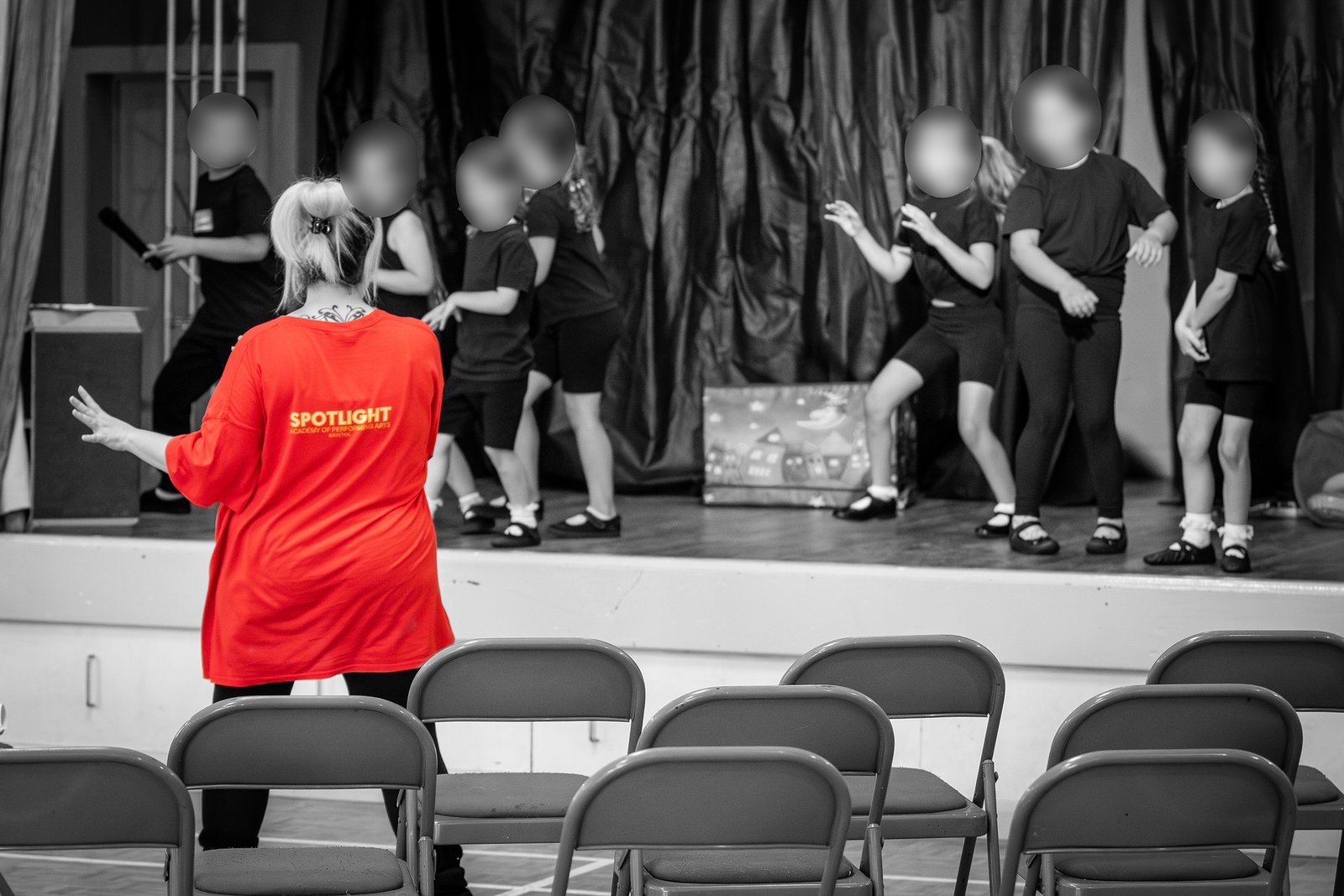 A Spotlight teacher leading young performers during the 2024 workshop