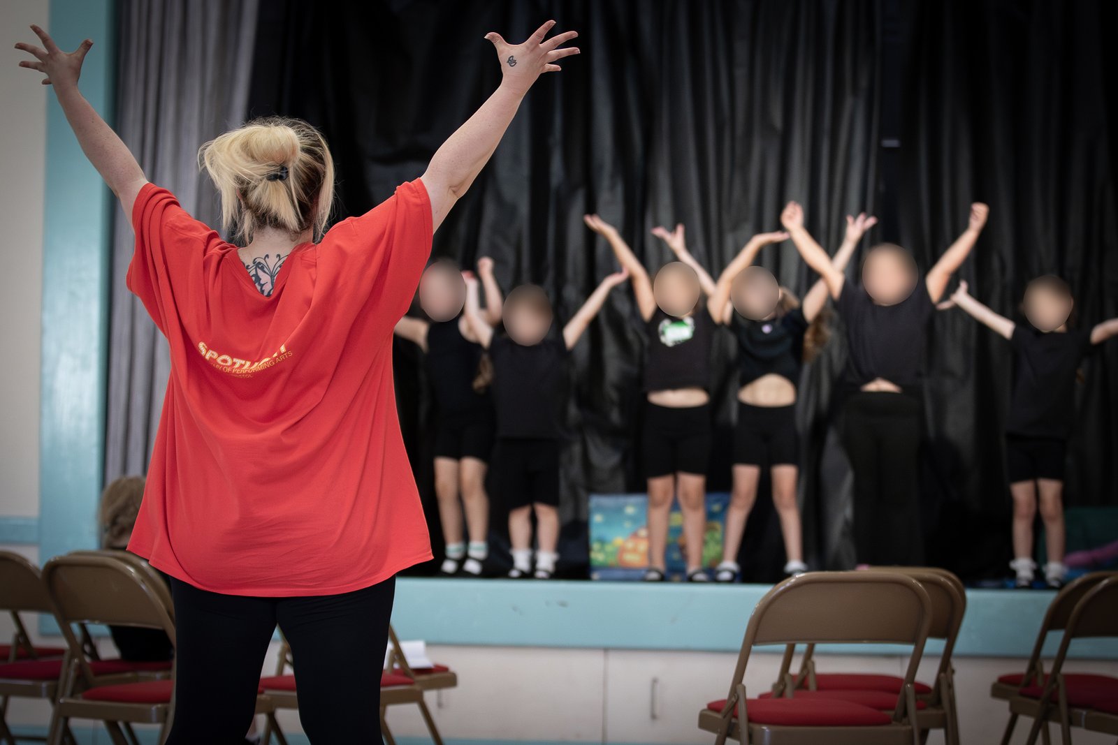 Young performers practising together during the 2024 workshop